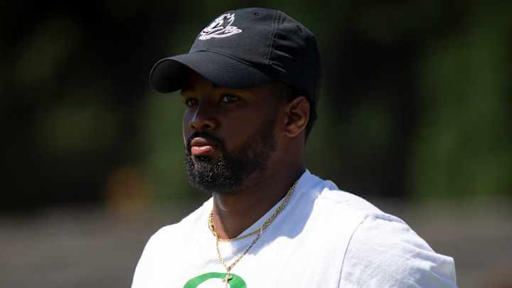 Oregon running backs coach Ra'Shaad Samples works with the team during the Ducks’ fall camp Tuesday, Aug. 6, 2024, at the Hatfield-Dowlin Complex in Eugene, Ore.
