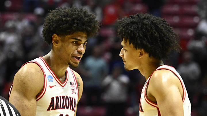 Mar 22, 2026; San Diego, CA, USA; Arizona Wildcats forward Koa Peat (10) celebrates with guard Brayden Burries (5) after defeating the Utah State Aggies during a second round game of the men's 2026 NCAA Tournament at Viejas Arena. Mandatory Credit: Denis Poroy-Imagn Images Mar 22, 2026; San Diego, CA, USA; Arizona Wildcats forward Koa Peat (10) celebrates with guard Brayden Burries (5) after defeating the Utah State Aggies during a second round game of the men's 2026 NCAA Tournament at Viejas Arena. Mandatory Credit: Denis Poroy-Imagn Images
