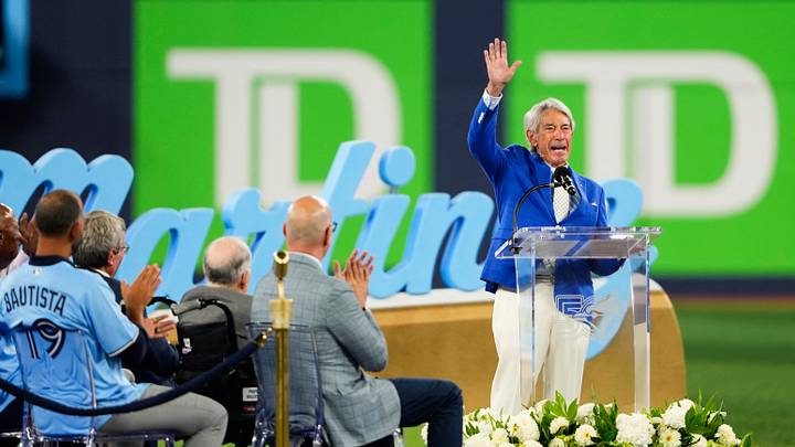Aug 29, 2026; Toronto, Ontario, CAN;  Buck Martinez waves to the fans during a pregame ceremony to honour him before a game between the Toronto Blue Jays and Seattle Mariners at Rogers Centre.  Mandatory Credit: Kevin Sousa-Imagn Images