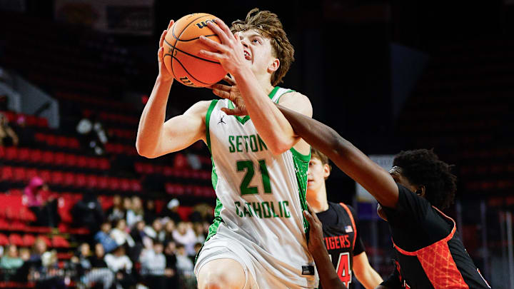 Allan Eagles (21) and the Seton Catholic boys basketball team continue to move up in the state rankings. Allan Eagles (21) and the Seton Catholic boys basketball team continue to move up in the state rankings.