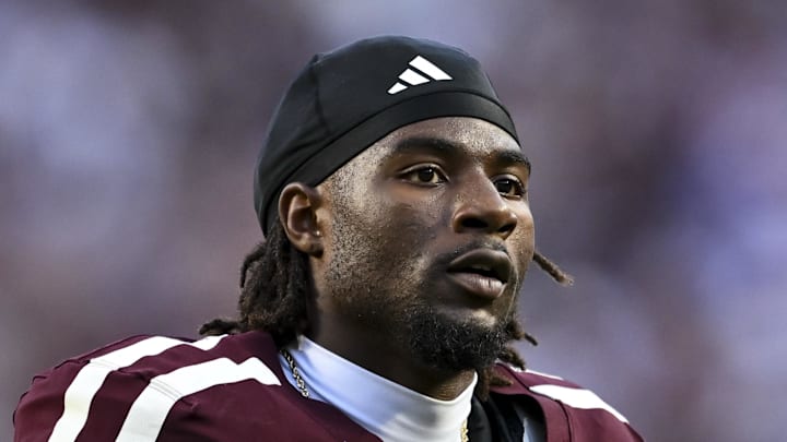 Texas A&M Aggies running back Le'Veon Moss (8) looks on prior to the game against the Florida Gators at Kyle Field. Mandatory Credit: Maria Lysaker-Imagn Images Texas A&M Aggies running back Le'Veon Moss (8) looks on prior to the game against the Florida Gators at Kyle Field. Mandatory Credit: Maria Lysaker-Imagn Images