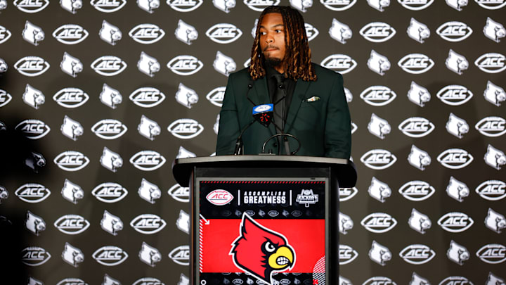 Louisville linebacker T.J. Quinn speaks at the 2025 ACC Football Kickoff