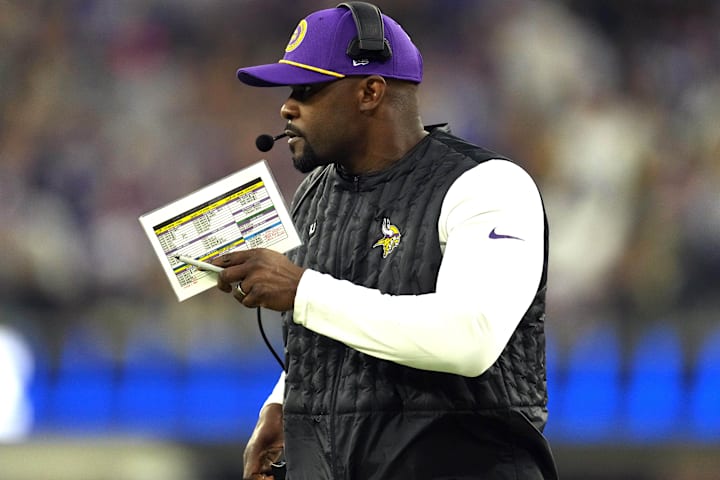 Minnesota Vikings defensive coordinator Brian Flores watches from the sidelines against the Los Angeles Rams.