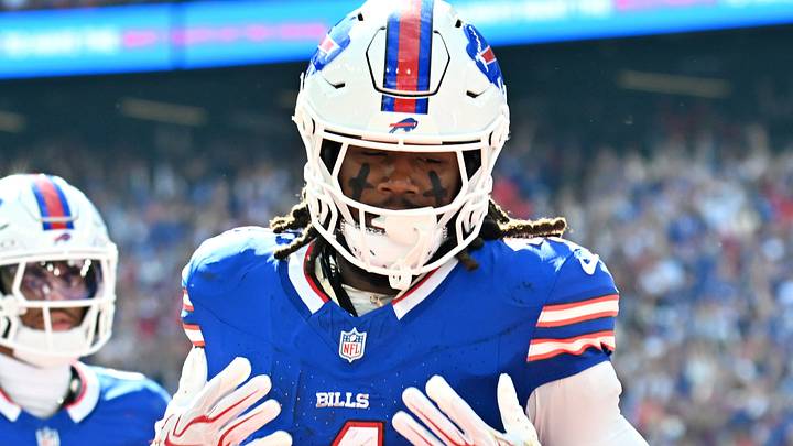 Buffalo Bills running back James Cook celebrates after scoring a touchdown against the New England Patriots at New Highmark Stadium. Buffalo Bills running back James Cook celebrates after scoring a touchdown against the New England Patriots at New Highmark Stadium.