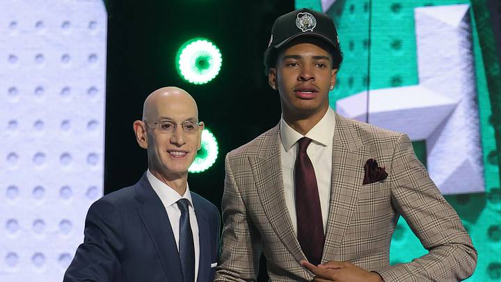 Jun 23, 2026; New York, NY, USA; NBA commissioner Adam Silver greets the twenty seventh pick in the 2026 NBA draft, Houston forward Chris Cenac Jr. after he was selected by the Boston Celtics at Barclays Center. Mandatory Credit: Brad Penner-Imagn Images