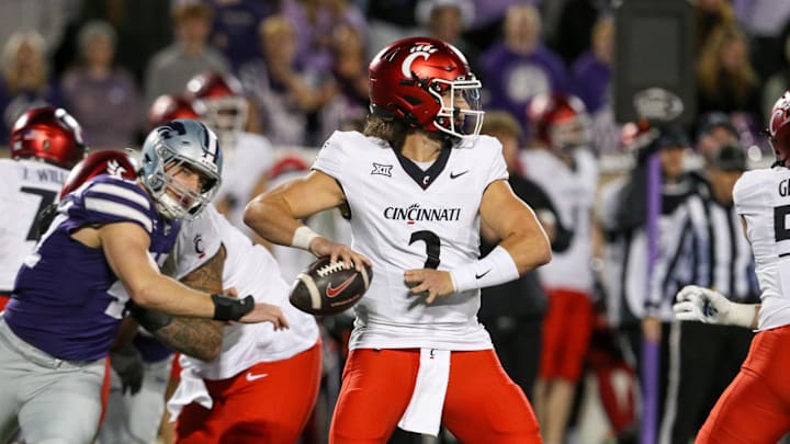 Nov 23, 2024; Manhattan, Kansas, USA; Cincinnati Bearcats quarterback Brendan Sorsby (2) drops back to pass during the fourth quarter against the Kansas State Wildcats at Bill Snyder Family Football Stadium. Mandatory Credit: Scott Sewell-Imagn Images