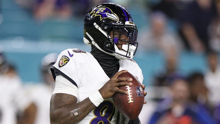 Oct 30, 2025; Miami Gardens, Florida, USA; Baltimore Ravens quarterback Lamar Jackson (8) looks to pass against the Miami Dolphins in the third quarter at Hard Rock Stadium. Mandatory Credit: Nathan Ray Seebeck-Imagn Images