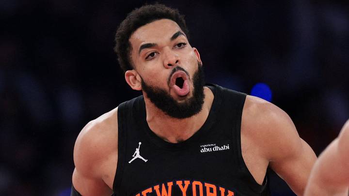 May 21, 2026; New York, New York, USA; New York Knicks center Karl-Anthony Towns (32) reacts as Cleveland Cavaliers guard Max Strus (2) runs up the court during the second quarter of game two of the eastern conference finals of the 2026 NBA playoffs at Madison Square Garden. Mandatory Credit: Vincent Carchietta-Imagn Images