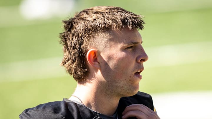 Apr 26, 2025; Iowa City, IA, USA; Iowa’s Rhys Dakin (9) looks on during a spring NCAA football open practice at Kinnick Stadium. Mandatory Credit: Joseph Cress/For the Register