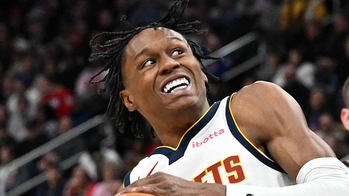 Feb 3, 2026; Detroit, Michigan, USA;  Denver Nuggets guard Peyton Watson (8) drives to the basket against Detroit Pistons forward Isaiah Stewart (28) in the third quarter at Little Caesars Arena. Mandatory Credit: Lon Horwedel-Imagn Images