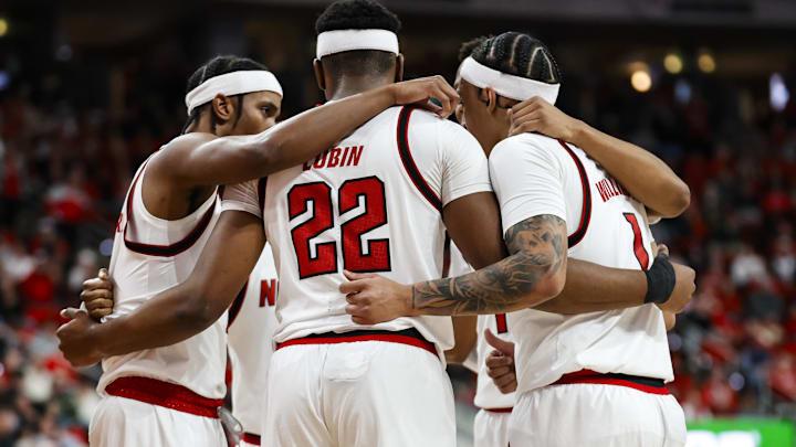 Jan 27, 2026; Raleigh, North Carolina, USA; NC State Wolfpack huddles during the first half of the game against the Syracuse Orange at Lenovo Center. Mandatory Credit: Jaylynn Nash-Imagn Images