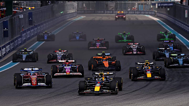 May 4, 2024; Miami Gardens, Florida, USA; Red Bull Racing driver Max Verstappen (1) leads the start of the F1 Sprint Race at Miami International Autodrome. Mandatory Credit: Peter Casey-Imagn Images