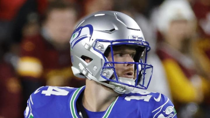 Seattle Seahawks quarterback Sam Darnold throws the ball against the Washington Commanders.