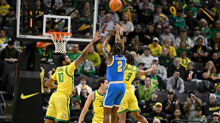 1Dec 8, 2024; Eugene, Oregon, USA; UCLA Bruins guard Dylan Andrews (2) scores a three point shot during the first half against the Oregon Ducks at Matthew Knight Arena. Mandatory Credit: Craig Strobeck-Imagn Images 1Dec 8, 2024; Eugene, Oregon, USA; UCLA Bruins guard Dylan Andrews (2) scores a three point shot during the first half against the Oregon Ducks at Matthew Knight Arena. Mandatory Credit: Craig Strobeck-Imagn Images