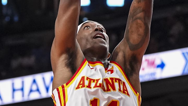 Apr 13, 2025; Atlanta, Georgia, USA; Atlanta Hawks guard Terance Mann (14) dunks behind Orlando Magic center Goga Bitadze (35) during the second half at State Farm Arena. Mandatory Credit: Dale Zanine-Imagn Images Apr 13, 2025; Atlanta, Georgia, USA; Atlanta Hawks guard Terance Mann (14) dunks behind Orlando Magic center Goga Bitadze (35) during the second half at State Farm Arena. Mandatory Credit: Dale Zanine-Imagn Images