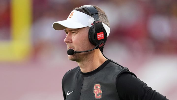Aug 30, 2025; Los Angeles, California, USA; Southern California Trojans head coach Lincoln Riley watches from the sidelines against the Missouri State Bears in the first half at United Airlines Field at Los Angeles Memorial Coliseum. Mandatory Credit: Kirby Lee-Imagn Images