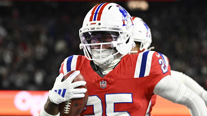 Dec 1, 2025; Foxborough, Massachusetts, USA; New England Patriots cornerback Marcus Jones (25) returns a punt for a touchdown during the first quarter against the New York Giants at Gillette Stadium. Mandatory Credit: Eric Canha-Imagn Images