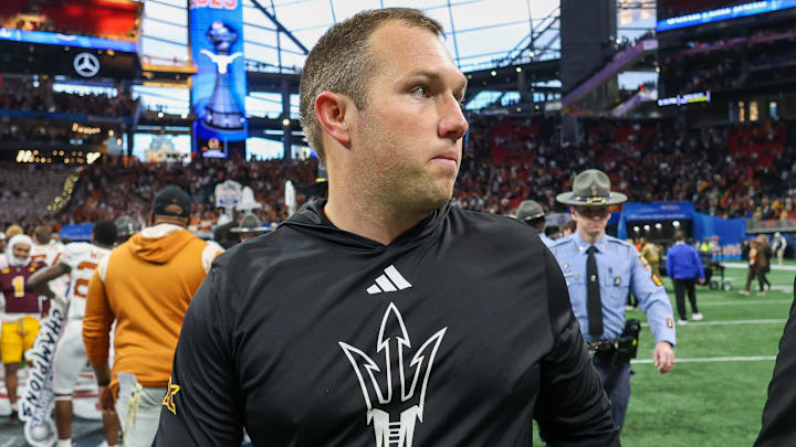 Jan 1, 2025; Atlanta, GA, USA; Arizona State Sun Devils head coach Kenny Dillingham walks off the field after a loss to the Texas Longhorns in the Peach Bowl at Mercedes-Benz Stadium. Mandatory Credit: Brett Davis-Imagn Images Jan 1, 2025; Atlanta, GA, USA; Arizona State Sun Devils head coach Kenny Dillingham walks off the field after a loss to the Texas Longhorns in the Peach Bowl at Mercedes-Benz Stadium. Mandatory Credit: Brett Davis-Imagn Images