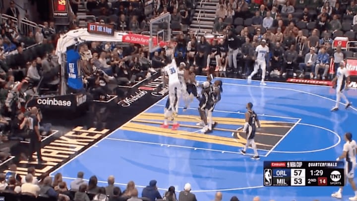 Orlando Magic center Bitadze dunks over Milwaukee Bucks forward Antetokounmpo