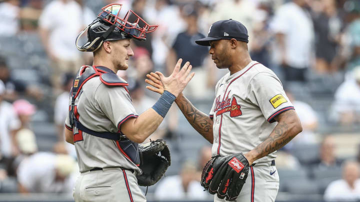 Atlanta Braves pitcher Raisel Iglesias celebrates with catcher Sean Murphy after recording save and defeating the New York Yankees Atlanta Braves pitcher Raisel Iglesias celebrates with catcher Sean Murphy after recording save and defeating the New York Yankees