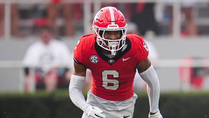 Oct 18, 2025; Athens, Georgia, USA; Mississippi Rebels wide receiver De'Zhaun Stribling (1) runs for a touchdown against Georgia Bulldogs defensive back Daylen Everette (6) during the second half of the game at Sanford Stadium. Mandatory Credit: Dale Zanine-Imagn Images Oct 18, 2025; Athens, Georgia, USA; Mississippi Rebels wide receiver De'Zhaun Stribling (1) runs for a touchdown against Georgia Bulldogs defensive back Daylen Everette (6) during the second half of the game at Sanford Stadium. Mandatory Credit: Dale Zanine-Imagn Images