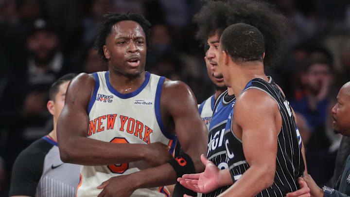 Dec 7, 2025; New York, New York, USA;  New York Knicks forward Og Anunoby (8) argues with Orlando Magic guard Desmond Bane (3) in the fourth quarter at Madison Square Garden. Mandatory Credit: Wendell Cruz-Imagn Images