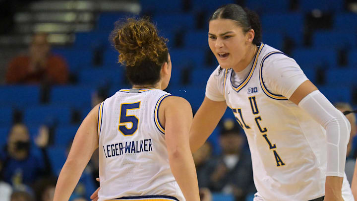 Jan 21, 2026; Los Angeles, California, USA;  UCLA Bruins center Lauren Betts (51) congratulates guard Charlisse Leger-Walker (5) after a 3-point basket in the second half against the Purdue Boilermakers at Pauley Pavilion presented by Wescom Financial. Mandatory Credit: Jayne Kamin-Oncea-Imagn Images