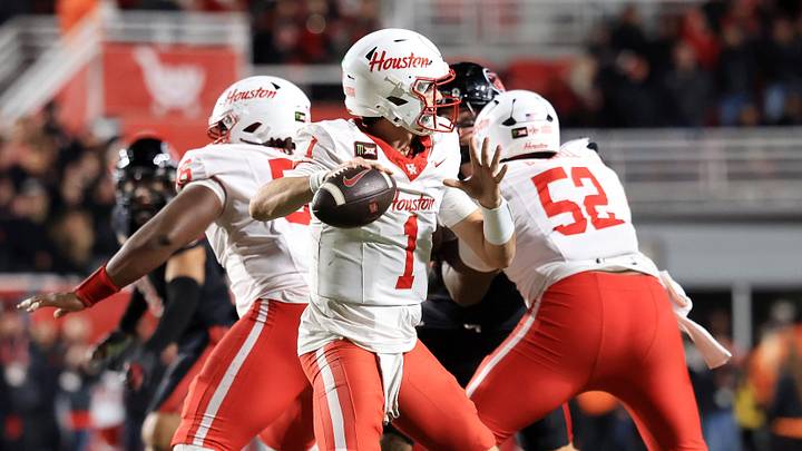 Oct 24, 2026; Salt Lake City, Utah, USA;  Houston Cougars quarterback Conner Weigman (1) throws a pass during the fourth quarter against the Utah Utes at Rice-Eccles Stadium.  Mandatory Credit: Rob Gray-Imagn Images