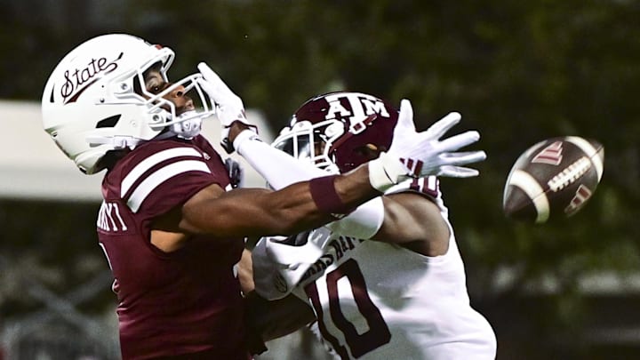 Texas A&M Aggies defensive back Dezz Ricks (10) breaks up a pass intended for Mississippi State Bulldogs wide receiver Kelly Akharaiyi (1) during the fourth quarter at Davis Wade Stadium at Scott Field.