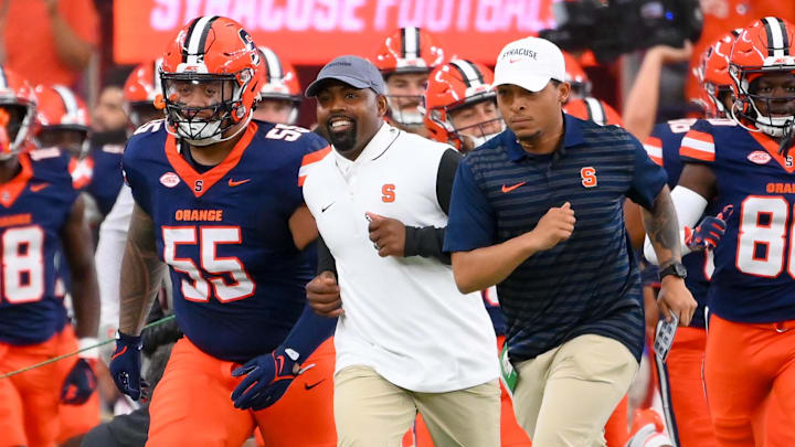 Syracuse Orange head coach Fran Brown jogs on the field prior to the game against the Ohio Bobcats.