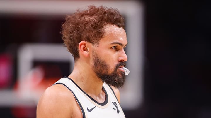 Mar 22, 2025; Atlanta, Georgia, USA; Atlanta Hawks guard Trae Young (11) in action against the Golden State Warriors in the fourth quarter at State Farm Arena. Mandatory Credit: Brett Davis-Imagn Images
