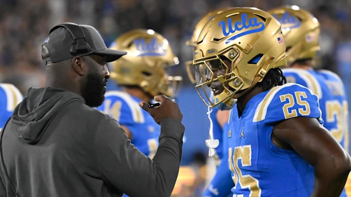 Sep 28, 2024; Pasadena, California, USA; UCLA Bruins head coach DeShaun Foster talks to Oregon Ducks at the Rose Bowl. Mandatory Credit: Robert Hanashiro-Imagn Images