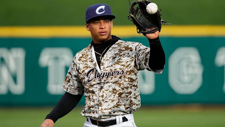 Apr 3, 2024; Columbus, OH, USA; Columbus Clippers third baseman Juan Brito (24) warms up prior to the Opening Day game against the Omaha Storm Chasers at Huntington Park.