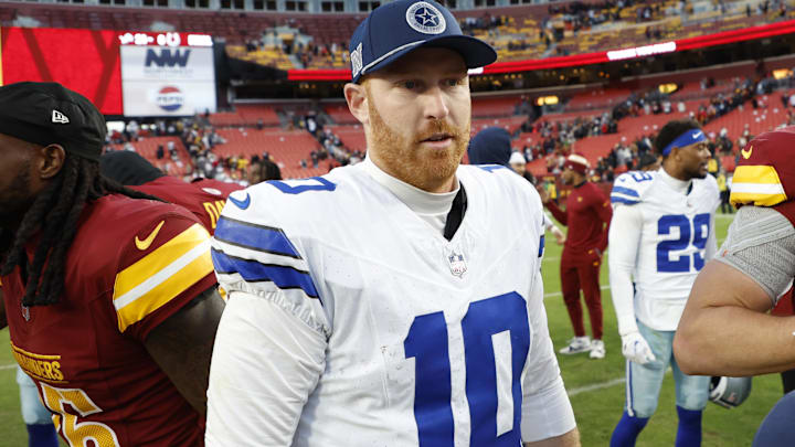Nov 24, 2024; Landover, Maryland, USA; Dallas Cowboys quarterback Cooper Rush (10) walks off the field after shaking hands with Washington Commanders players after their game at Northwest Stadium. Mandatory Credit: Geoff Burke-Imagn Images
