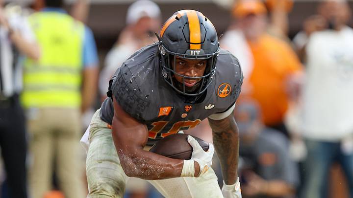 Oct 3, 2026; Knoxville, Tennessee, USA;  Tennessee Volunteers running back DeSean Bishop (18) scores a touchdown against the Auburn Tigers during the second half at Neyland Stadium.  Mandatory Credit: Randy Sartin-Imagn Images