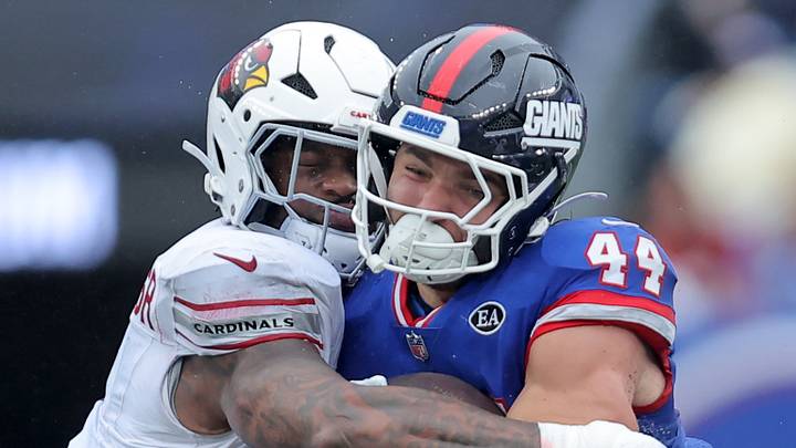 Oct 4, 2026; East Rutherford, New Jersey, USA; New York Giants running back Cam Skattebo (44) runs with the ball against Arizona Cardinals linebacker Mack Wilson Sr. (1) during the fourth quarter at MetLife Stadium. Mandatory Credit: Brad Penner-Imagn Images Oct 4, 2026; East Rutherford, New Jersey, USA; New York Giants running back Cam Skattebo (44) runs with the ball against Arizona Cardinals linebacker Mack Wilson Sr. (1) during the fourth quarter at MetLife Stadium. Mandatory Credit: Brad Penner-Imagn Images
