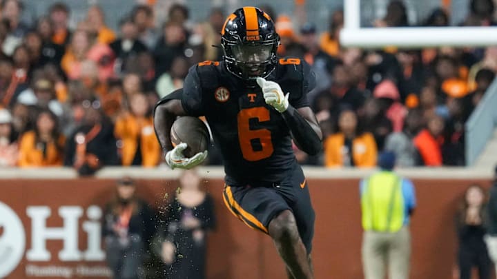 Nov 2, 2024; Knoxville, Tennessee, USA; Tennessee Volunteers running back Dylan Sampson (6) runs with the ball against the Kentucky Wildcats during the second half at Neyland Stadium. 