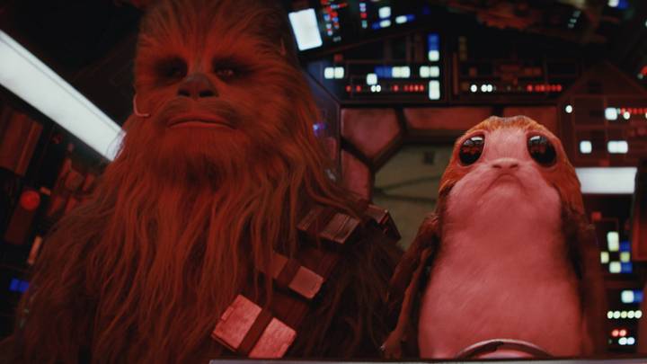 Star Wars: The Last Jedi..L to R: Chewbacca (Joonas Suotamo) and a Porg..Photo: Industrial Light & Magic/Lucasfilm..©2017 Lucasfilm Ltd. All Rights Reserved. Star Wars: The Last Jedi..L to R: Chewbacca (Joonas Suotamo) and a Porg..Photo: Industrial Light & Magic/Lucasfilm..©2017 Lucasfilm Ltd. All Rights Reserved.