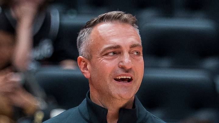 Toronto Raptors head coach Darko Rajakovic smiles during a stop in play. Toronto Raptors head coach Darko Rajakovic smiles during a stop in play.