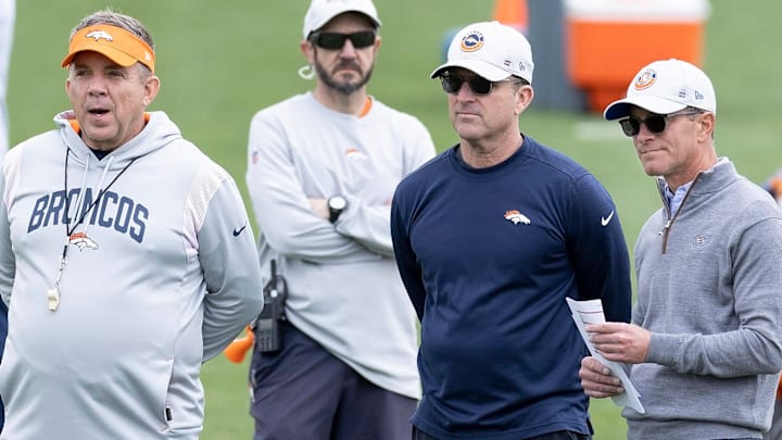 May 13, 2023, Englewood, Colorado, USA: Broncos Head Coach SEAN PAYTON, left, with General Mgr. GEORGE PATON, center, and CEO GREG PENNER look on from the field during Broncos Rookie Training Camp at the Denver Broncos Practice Facility Saturday afternoon. 