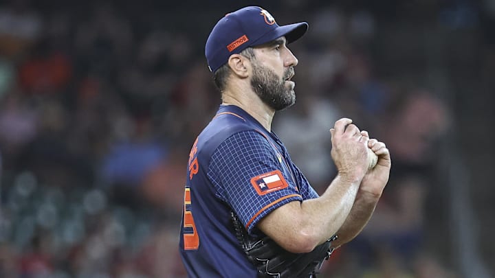 Jun 3, 2024; Houston, Texas, USA; Houston Astros starting pitcher Justin Verlander (35) reacts after a pitch during the first inning against the St. Louis Cardinals at Minute Maid Park