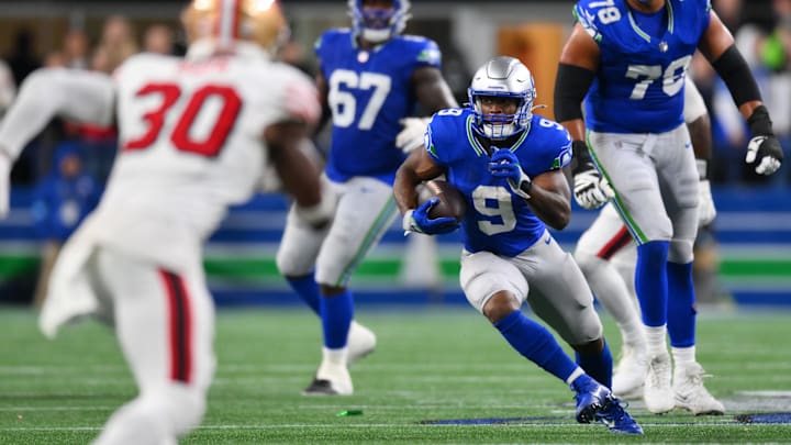 Oct 10, 2024; Seattle, Washington, USA; Seattle Seahawks running back Kenneth Walker III (9) carries the ball against the San Francisco 49ers during the second half at Lumen Field. Oct 10, 2024; Seattle, Washington, USA; Seattle Seahawks running back Kenneth Walker III (9) carries the ball against the San Francisco 49ers during the second half at Lumen Field.