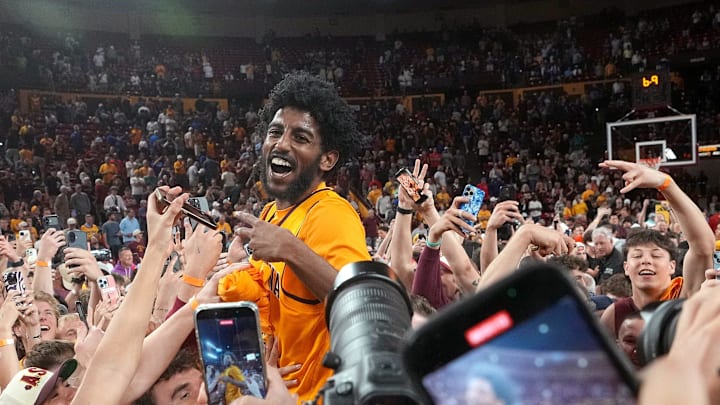 ASU Sun Devils guard Moe Odum (5) celebrates with fans after their 70-60 win over the Kansas Jayhawks at Desert Financial Arena in Tempe on March 3, 2026.