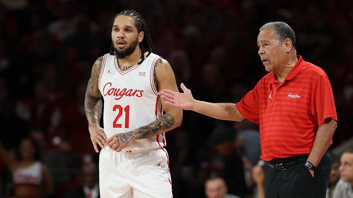 Feb 4, 2026; Houston, Texas, USA; Houston Cougars head coach Kelvin Sampson talks to guard Emanuel Sharp (21) in the first half against the UCF Knights at Fertitta Center. Mandatory Credit: Thomas Shea-Imagn Images Feb 4, 2026; Houston, Texas, USA; Houston Cougars head coach Kelvin Sampson talks to guard Emanuel Sharp (21) in the first half against the UCF Knights at Fertitta Center. Mandatory Credit: Thomas Shea-Imagn Images