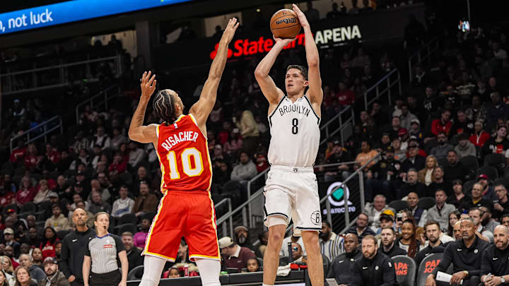 Feb 22, 2026; Atlanta, Georgia, USA; Brooklyn Nets guard Egor Demin (8) shoots over Atlanta Hawks forward Zaccharie Risacher (10) during the first half at State Farm Arena. Mandatory Credit: Dale Zanine-Imagn Images