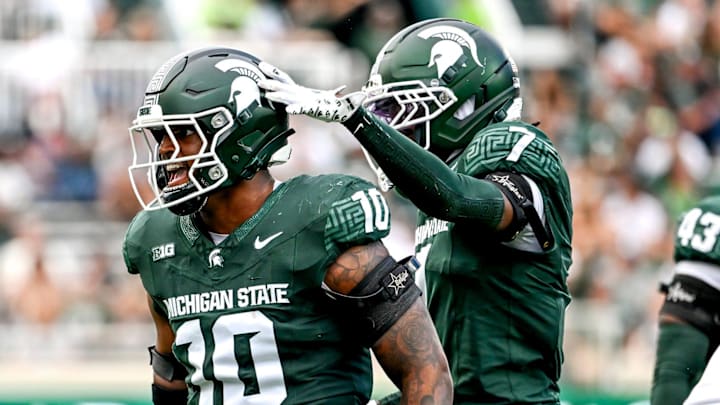 Michigan State's Wayne Matthews III, left, celebrates with Nikai Martinez after a tackle against Youngstown State during the third quarter on Saturday, Sept. 13, 2025, at Spartan Stadium in East Lansing.