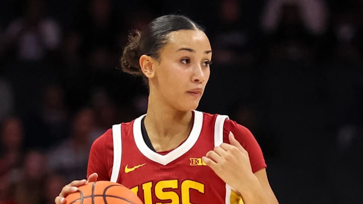Nov 9, 2025; Charlotte, North Carolina, USA; Southern California Trojans guard Jazzy Davidson (9) dribbles the ball against the NC State Wolfpack during the third quarter of the Ally Tipoff game at Spectrum Center. Mandatory Credit: Cory Knowlton-Imagn Images