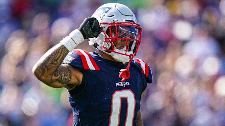 Sep 15, 2024; Foxborough, Massachusetts, USA; New England Patriots cornerback Christian Gonzalez (0) reacts after a play against the Seattle Seahawks in the second half at Gillette Stadium. Mandatory Credit: David Butler II-Imagn Images