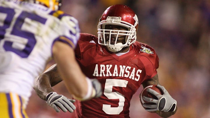 Arkansas Razorbacks tailback Darren McFadden (5) carries against the LSU Tigers in overtime at Tiger Stadium. The Razorbacks defeated the Tigers 50-48 in triple overtime. 