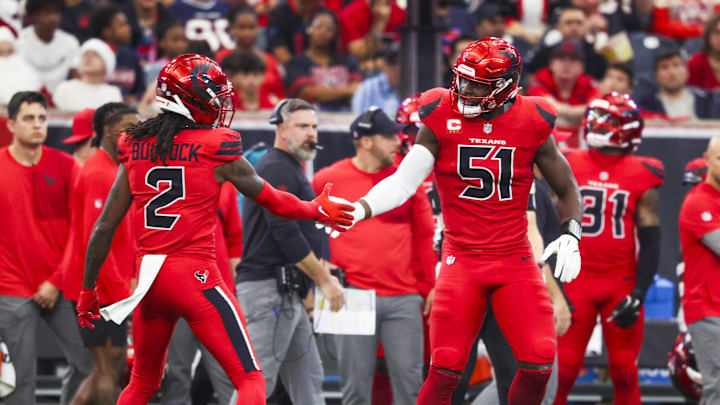 Dec 21, 2025; Houston, Texas, USA; Houston Texans defensive end Will Anderson Jr. (51) and safety Calen Bullock (2) react to a play against the Las Vegas Raiders during the second quarter at NRG Stadium. Mandatory Credit: Troy Taormina-Imagn Images